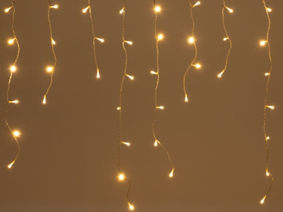 300 Led λαμπάκια IP44 ασύμμετρη κουρτίνα με 8 προγράμματα διάφανο καλώδιο και θερμό λευκό φως 600x70 εκ